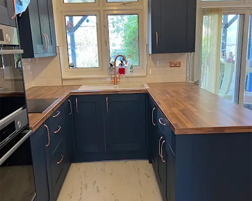 Shaker kitchen, oak tops by MB Kitchens in Essex
