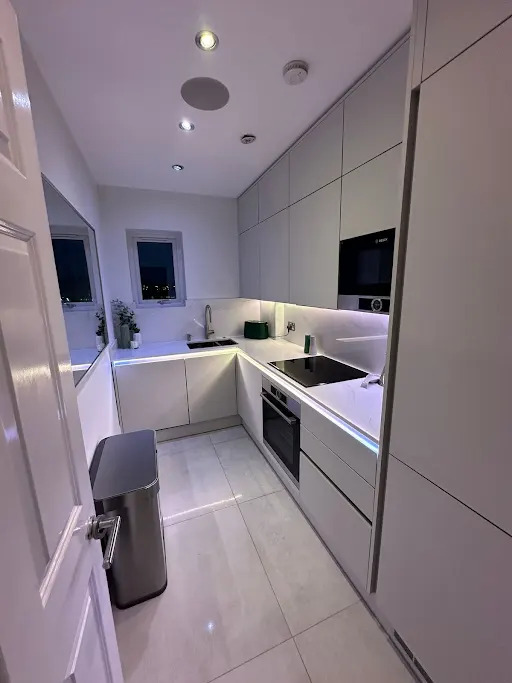 Handleless kitchen by MB Kitchens in Essex